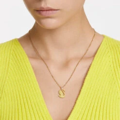 Swarovski Iconic Swan Pendant, Swan, Medium, Yellow, Gold-Tone Plated 5647553 -SWAROVSKI shop 30b8e99b 0ccf 528f ad3e 9185eef4c91e 09174.1673498779